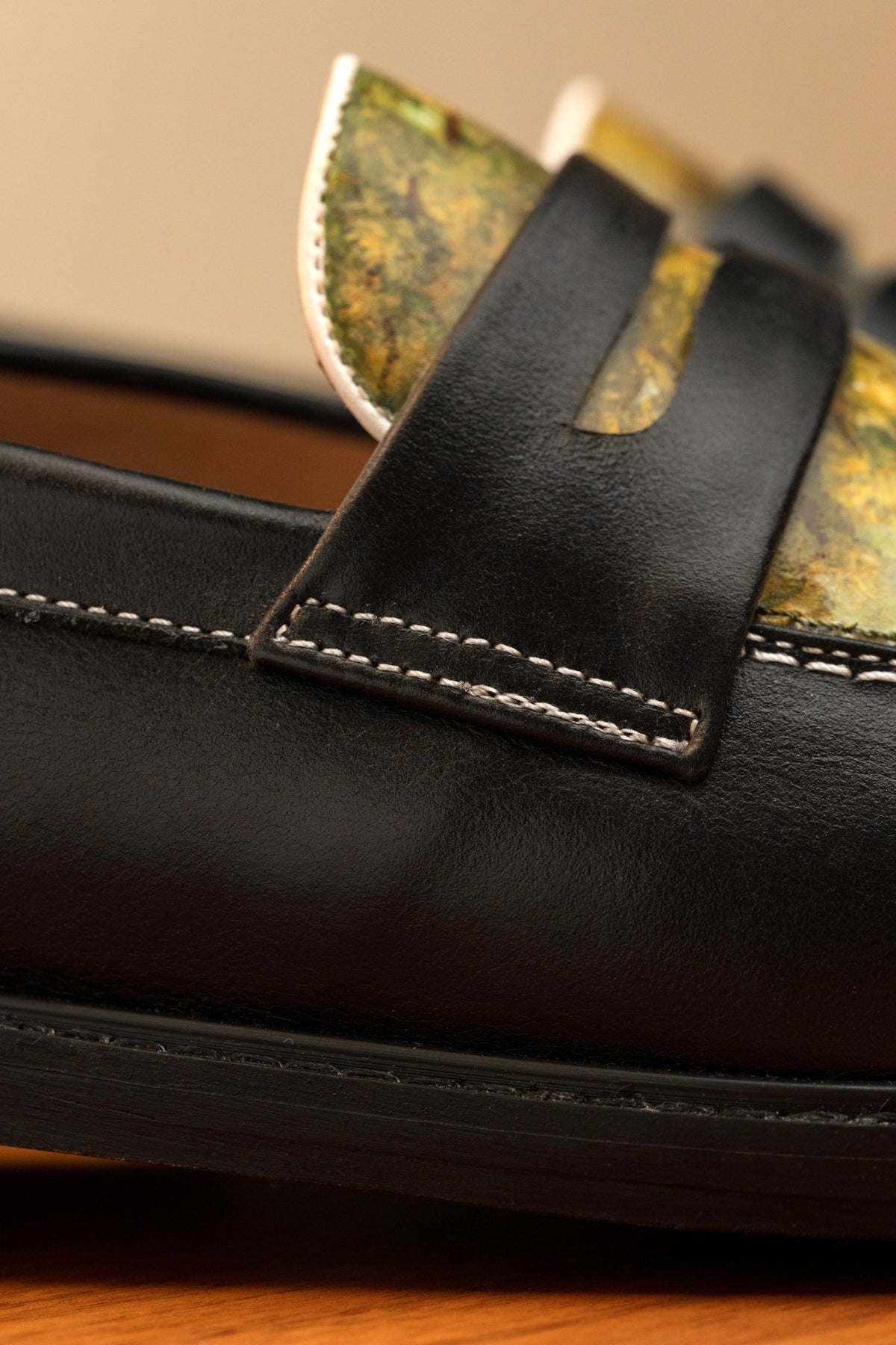 Natural grain and markings of full-grain leather